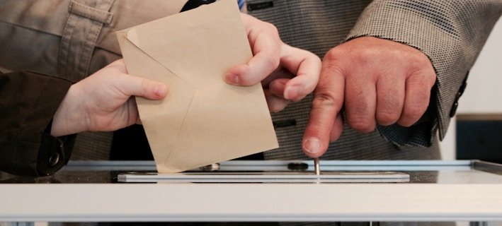 person standing near table