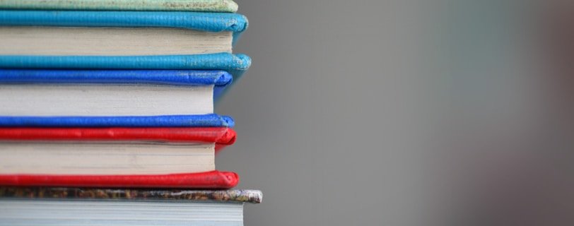 shallow focus photography of books