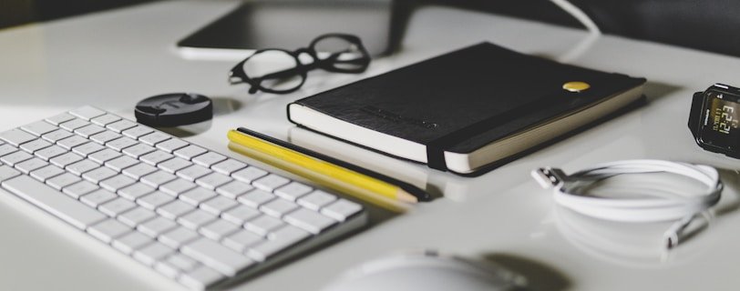 Apple Magic Keyboard and Apple Magic Mouse on white table