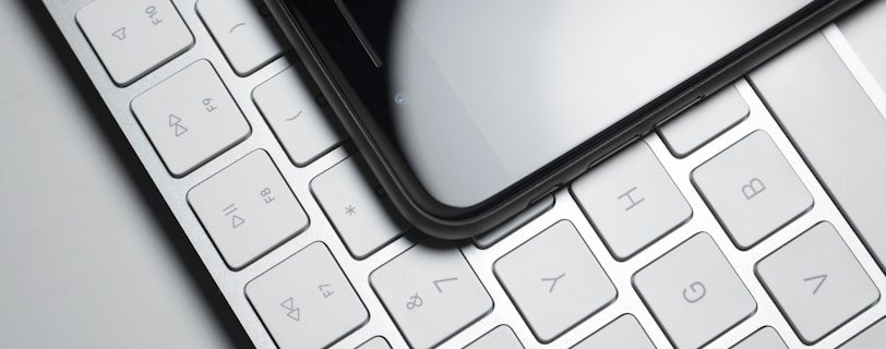 a close up of a computer keyboard with a mouse