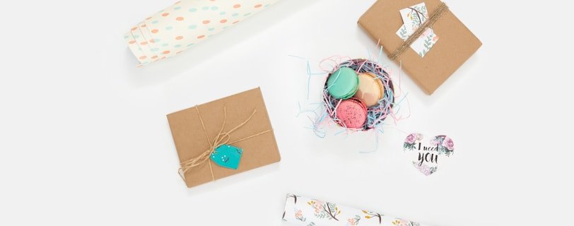 flat lay photography of wallpaper and box