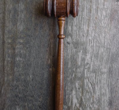 brown mallet on gray wooden surface