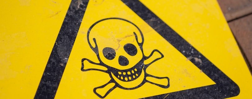 black and yellow poison sign