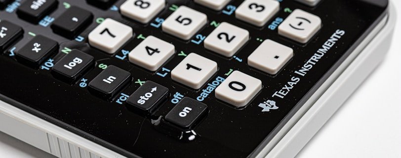 black and white Texas Instruments calculator