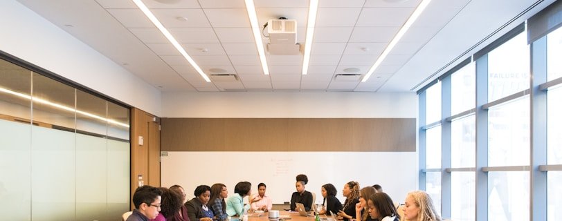 people sitting on conference room
