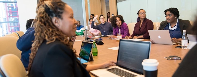 peope sitting around table