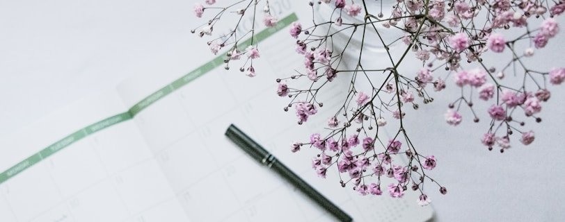 pink flowers on white paper