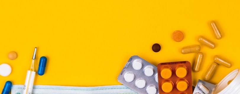 white and black dice on orange surface