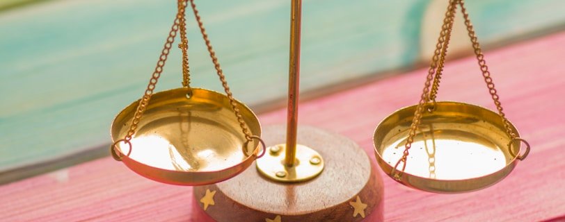 gold and silver round frame magnifying glass