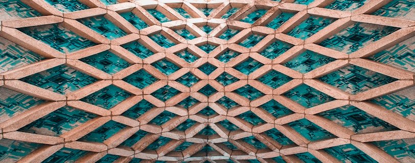 brown and white building under blue sky