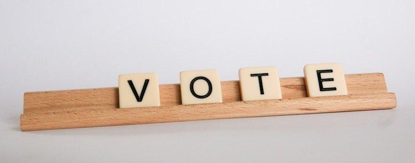 brown wooden letter t-letter