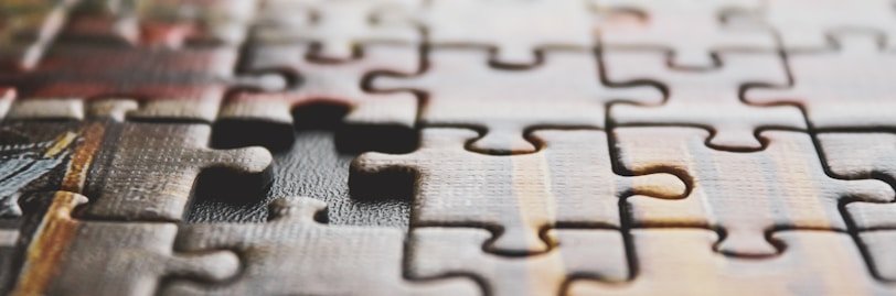 brown and black jigsaw puzzle