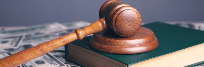 brown wooden chess piece on brown book