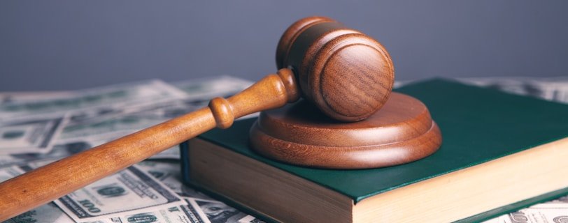 brown wooden chess piece on brown book