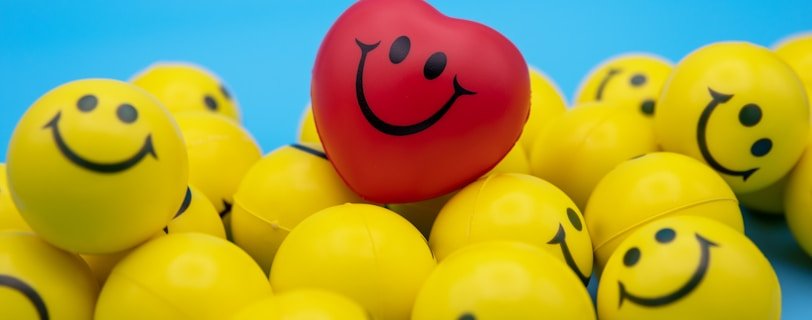 red and yellow smiley balloon