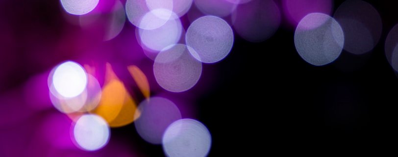 green and white bokeh lights