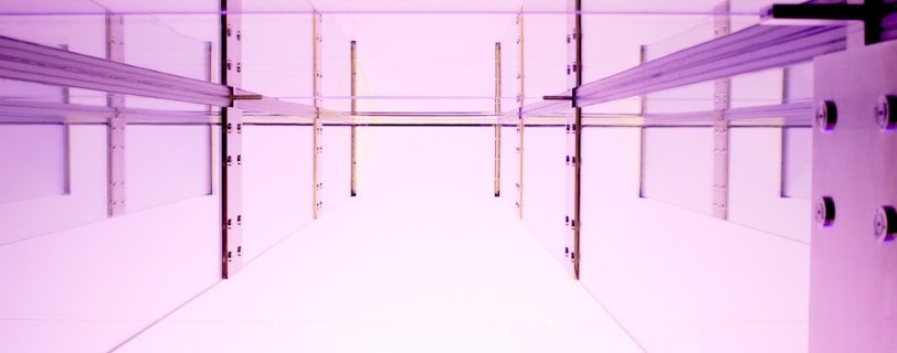 a room with purple walls and a white floor