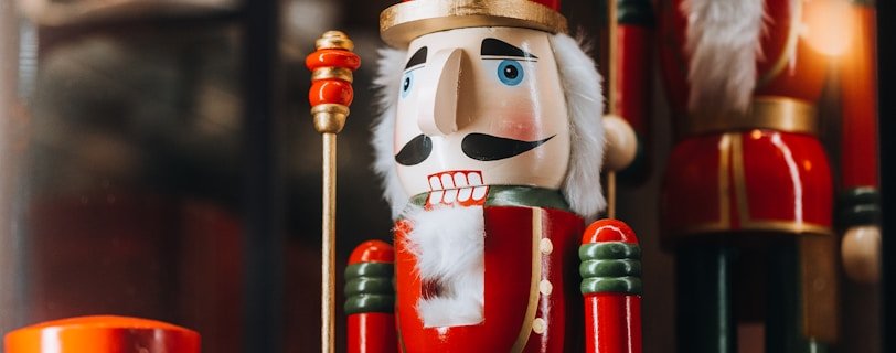 a group of nutcrackers sitting next to each other