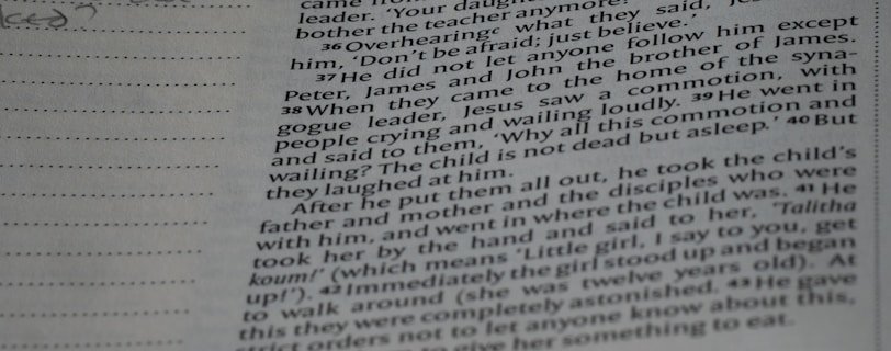 a close up of a book with writing on it